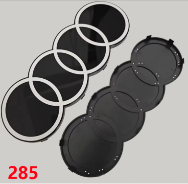 Original supplier front and rear mounting views of 2D-style front grille ring emblem, 285 mm width